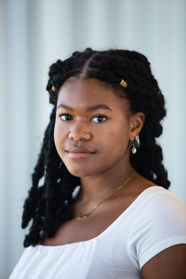 ACLU podcast associate producer Vanessa Handy with a neutral expression.