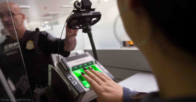 person scanning fingerprint