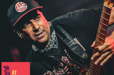 Tom Morello playing guitar on stage