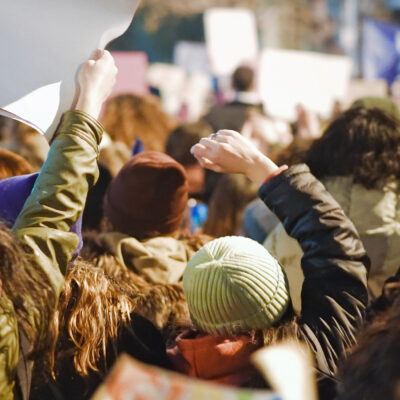 A backward view of protesters.