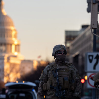 Members of the National Guard patrol the area surrounding the outskirts of the Capitol Building in Washington D.C.