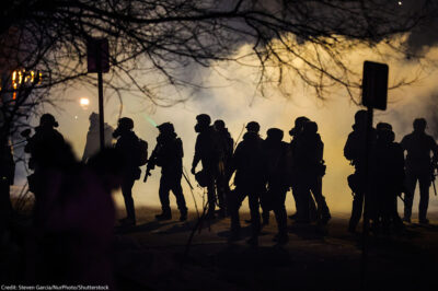 Federal law enforcement deploys gas at the site of a reported shooting in North Minneapolis.